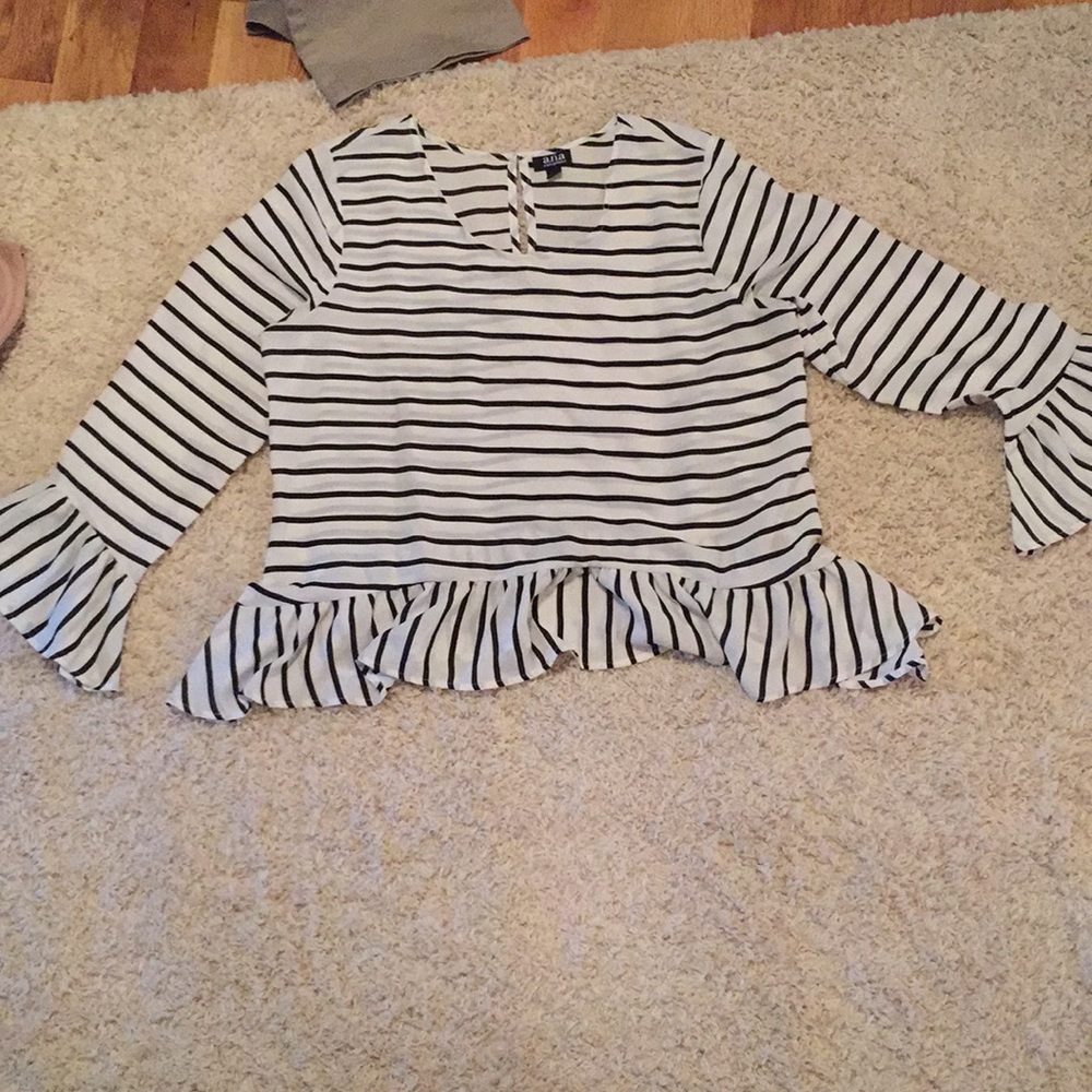 Ruffled black and white blouse